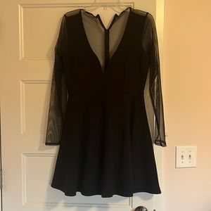 A nice dress that has mesh back  and sleeves